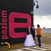 Mariusz Stachowiak i jego fotografia ślubna na dachu wrocławskiej Renomy